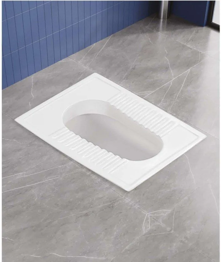 ZARA White City Pan 20" 1003 squatting pan in a bathroom setting